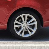 Unusable wheel photo: wheel photographed on a car